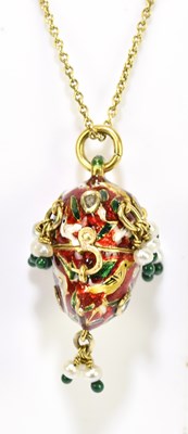 Lot 1308 - A Jaipur yellow metal enamel decorated egg...