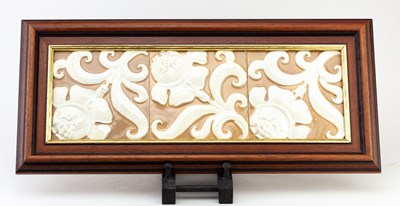 Lot 444 - DOULTON LAMBETH; a framed trio of tiles,...