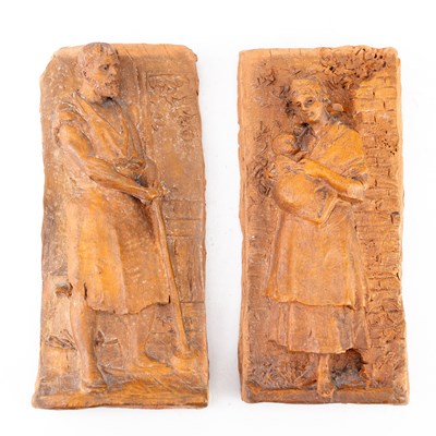 Lot 486 - A pair of Continental terracotta plaques...