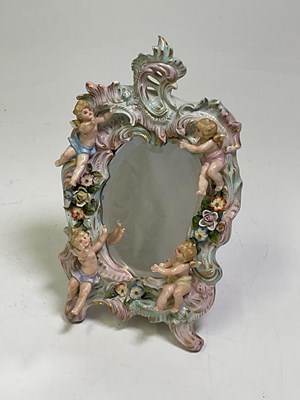 Lot 221 - A Sitzendorf dressing table mirror decorated...