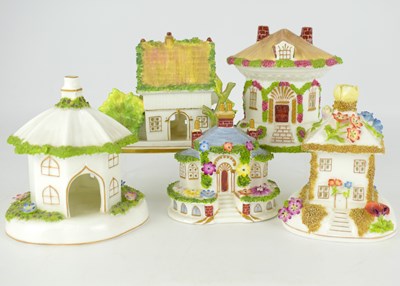 Lot 500 - COALPORT; five fine bone china cottages in the...