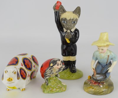 Lot 626 - Four modern collectible figures, comprising a...