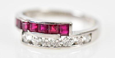 Lot 88 - A 14ct white gold ruby and diamond ring set...