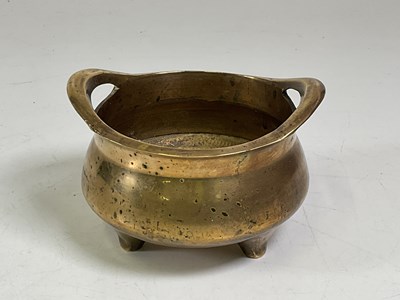 Lot 248 - A Chinese brass incense burner, diameter 13cm.