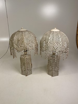 Lot 538 - A pair of decorative metal lamps with bead...