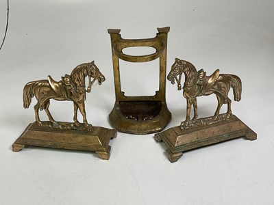 Lot 137 - A pair of brass doorstops in the form of...