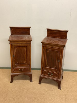 Lot 617 - A pair of Edwardian inlaid bedside cabinets...