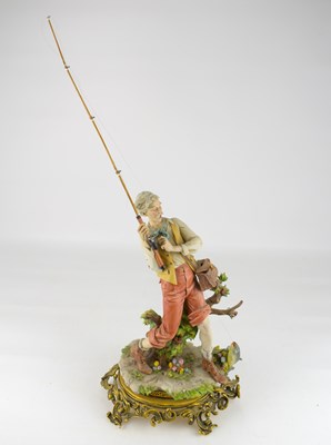 Lot 569 - CAPODIMONTE; a large porcelain figure...