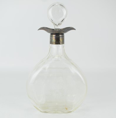 Lot 891 - A George V wheel cut blown glass decanter of...