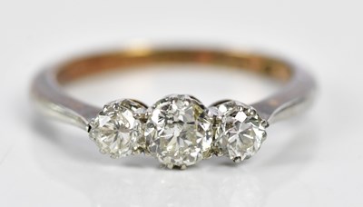 Lot 119 - An 18ct yellow gold three stone graduated...