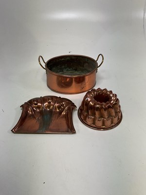 Lot 136 - A copper jelly mould together with a copper...