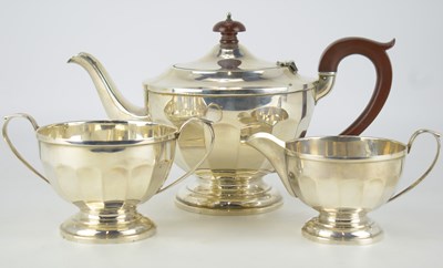 Lot 875 - A George V hallmarked silver three-piece tea...