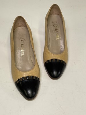 Lot 120 - Vintage Chanel beige and black leather court...