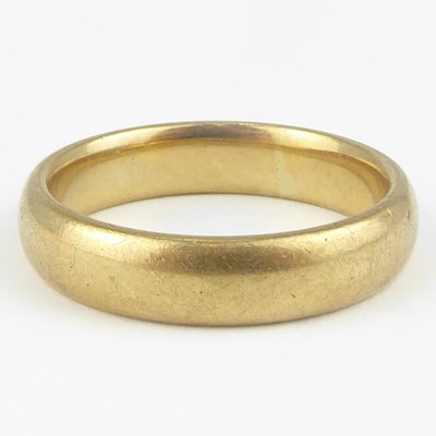 Lot 1038 - A heavy 9ct gold wedding band, size T, approx....