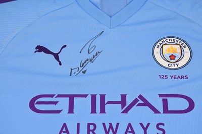 Lot 202 - SERGIO AGUERO; an autographed Manchester City...