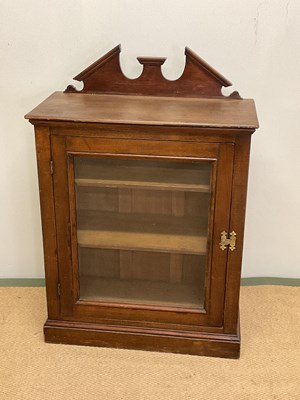 Lot 606 - A mahogany table top display cabinet, the...