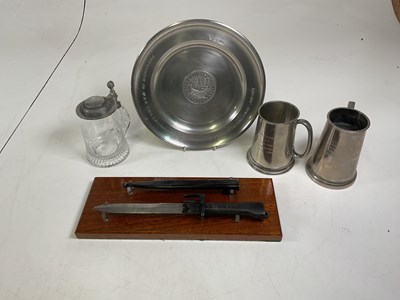 Lot 11 - A pewter military presentation plate...