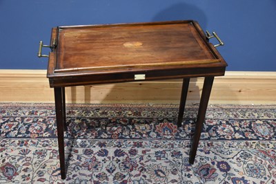 Lot 73 - An Edwardian Osterley folding mahogany tray...