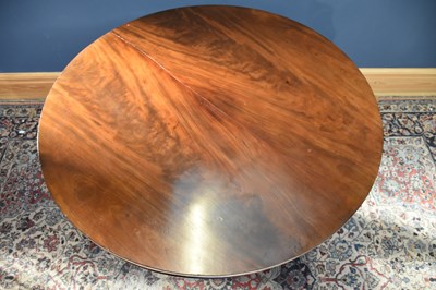 Lot 76 - A 19th century mahogany circular dining table...