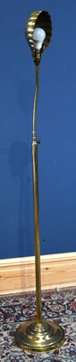 Lot 2241 - A modern brass reading lamp, height 160cm.