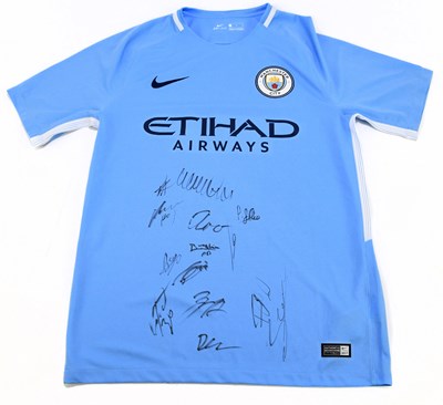 Lot 219 - MANCHESTER CITY; a part signed team home...