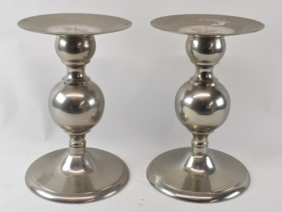 Lot 306 - POLS POTTEN; a pair of modern stainless steel...