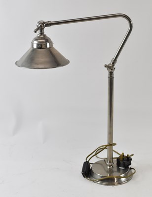 Lot 127 - A modern stainless steel Anglepoise type lamp,...