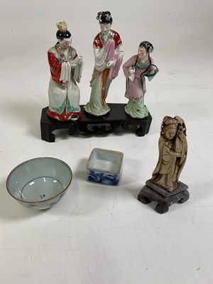 Lot 199 - A trio of Japanese porcelain figurines in...