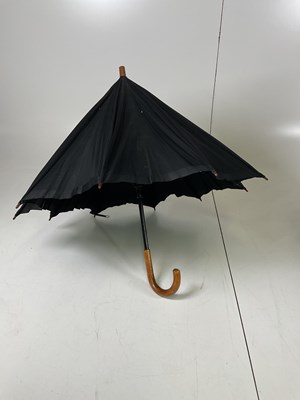 Lot 23 - Two vintage umbrellas and a walking stick (af).