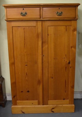 Lot 66 - An African yellow wood linen press, with two...