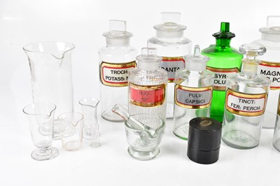 Lot 1384 - A collection of chemist jars, largest 24cm,...