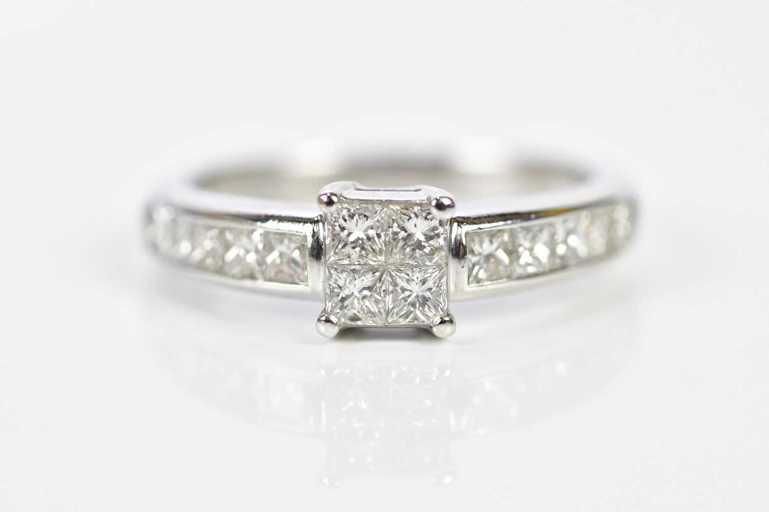 Lot 78 - An 18ct white gold dress ring, with a centre...
