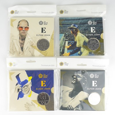 Lot 966 - ROYAL MINT; four Elton John £5 coin...