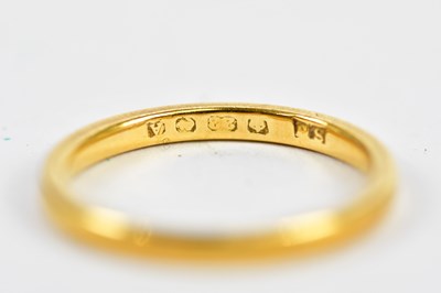 Lot 208 - A 22ct yellow gold wedding band, size M,...