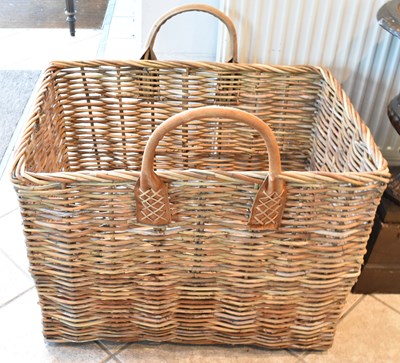 Lot 60 - A large twin handled wicker log basket, width...