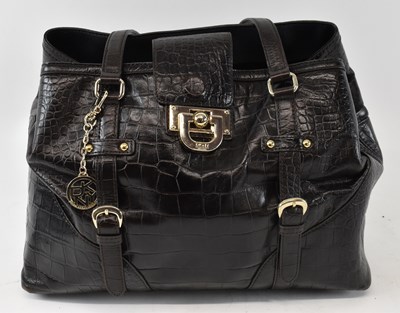 Lot 443 - DKNY; a black crocodile skin effect leather...