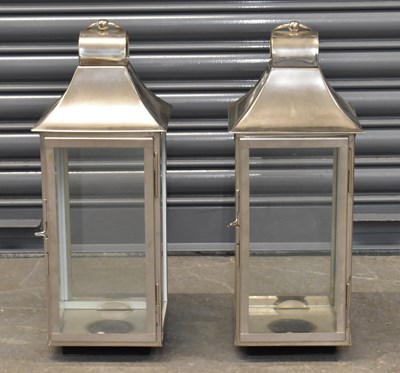 Lot 151 - A pair of modern stainless steel lanterns,...