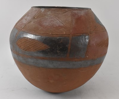 Lot 536 - A large African stoneware vessel, height 27cm,...