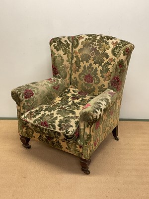 Lot 593 - An early 20th century upholstered armchair...