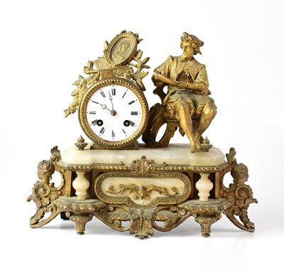 Lot 82 - A gilded brass and alabaster figural mantel...