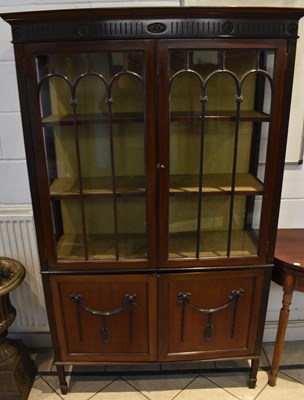 Lot 26 - An early 20th century mahogany display cabinet,...