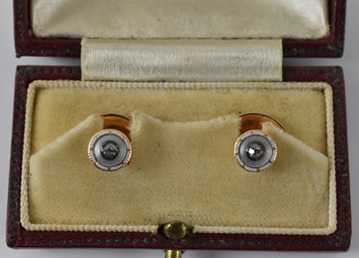 Lot 964 - A pair of 15ct yellow gold buttons, set with...