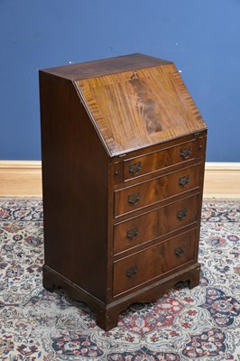 Lot 247 - A reproduction mahogany bureau with fitted...