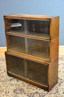 Lot 248 - MINTY; a three section stacking bookcase,...