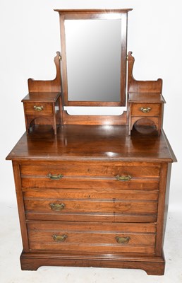 Lot 1593 - An Edwardian walnut dressing table, with...