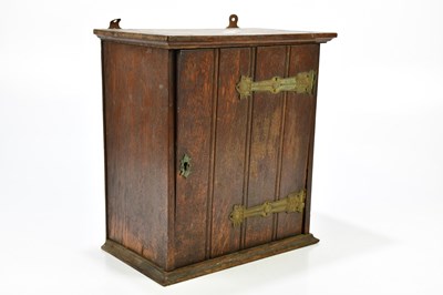 Lot 322 - An early 20th century oak hanging cupboard, 34...