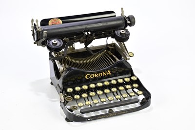 Lot 1098 - CORONA; a vintage typewriter, cased.