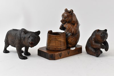 Lot 308 - A Black Forest carved standing bear, length...