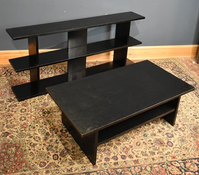 Lot 219 - A modern ebonised coffee table with undertier...