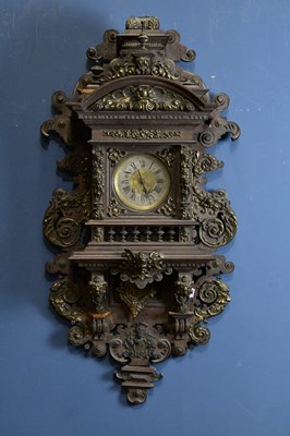 Lot 2055 - A large 20th century oak and brass wall clock,...